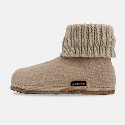 Haflinger Hüttenschuh Karl in Beige aus reiner Schurwolle mit Latex beschichteter Filzsohle Seitenansicht