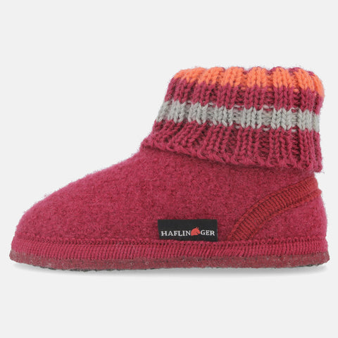 Haflinger Hüttenschuh Paul in Pink (Burgund) aus reiner Schurwolle mit Latex beschichteter Filzsohle Seitenansicht