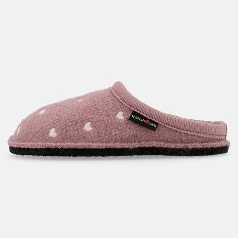 Haflinger Pantoffel Valentine in Pink (Rosenholz) aus Schurwolle mit Herzapplikation und Filzsohle Seitenansicht 
