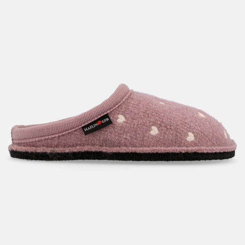 Haflinger Pantoffel Valentine in Pink (Rosenholz) aus Schurwolle mit Herzapplikation und Filzsohle Seitenansicht 